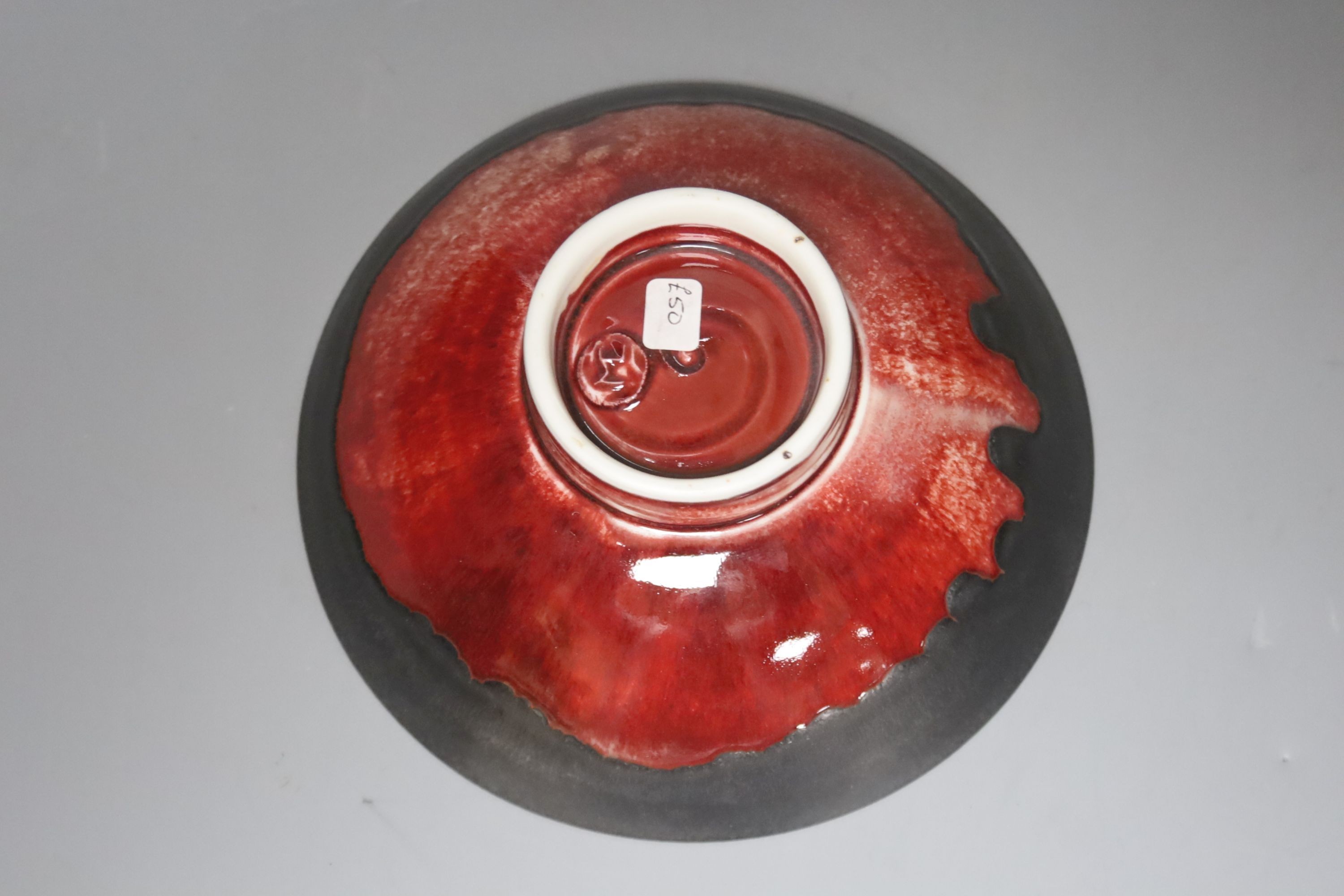 Eddie Curtis (b.1953), a copper red bowl, 16cm